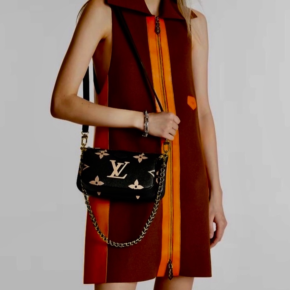 Louis Vuitton crossbody strap made for the accessory pouchette.